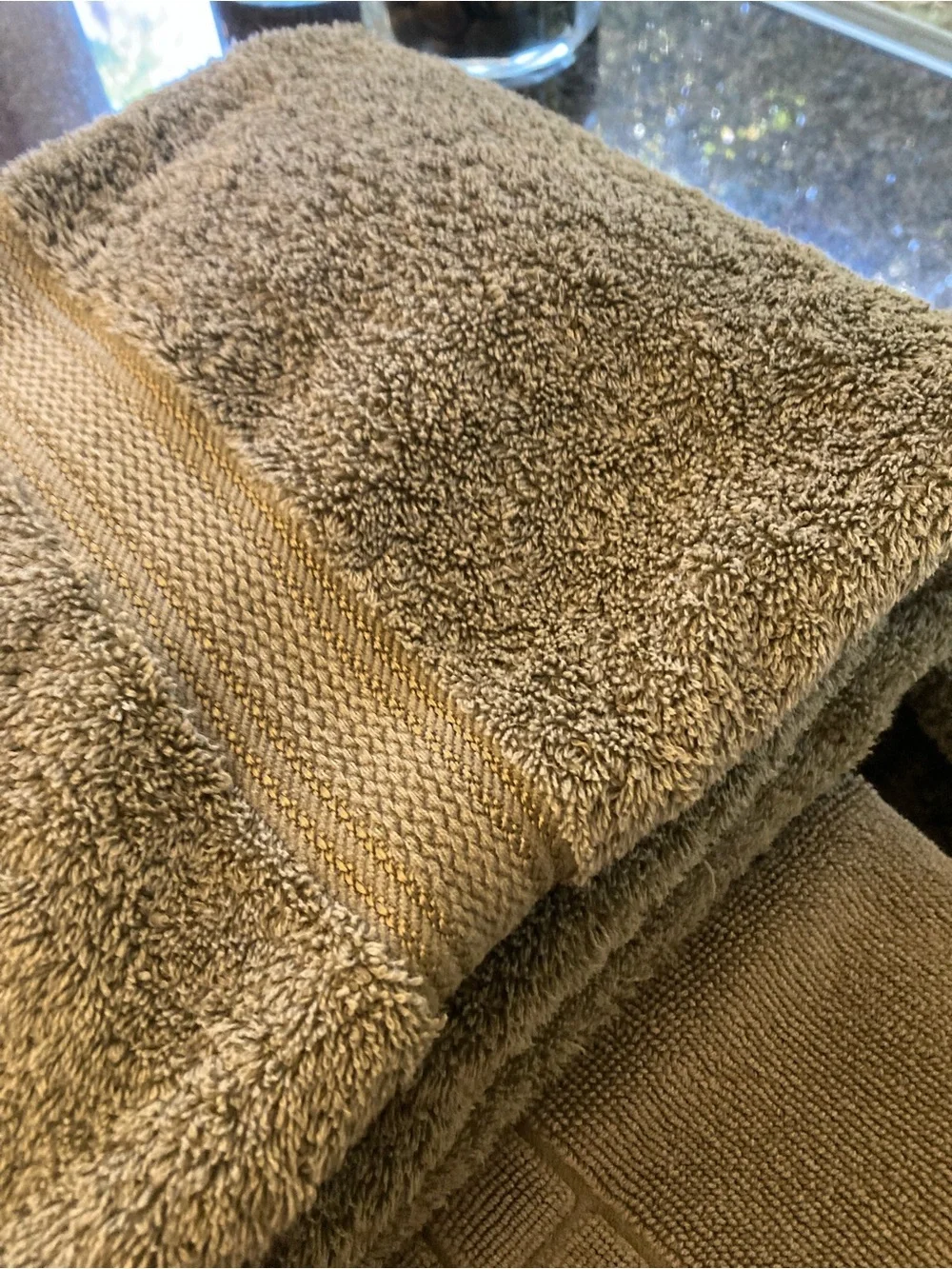 2 Croscill towels, 3 hand towels and 1 bath mat.